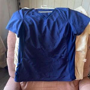 Size large navy blue Cherokee iflex scrub top.